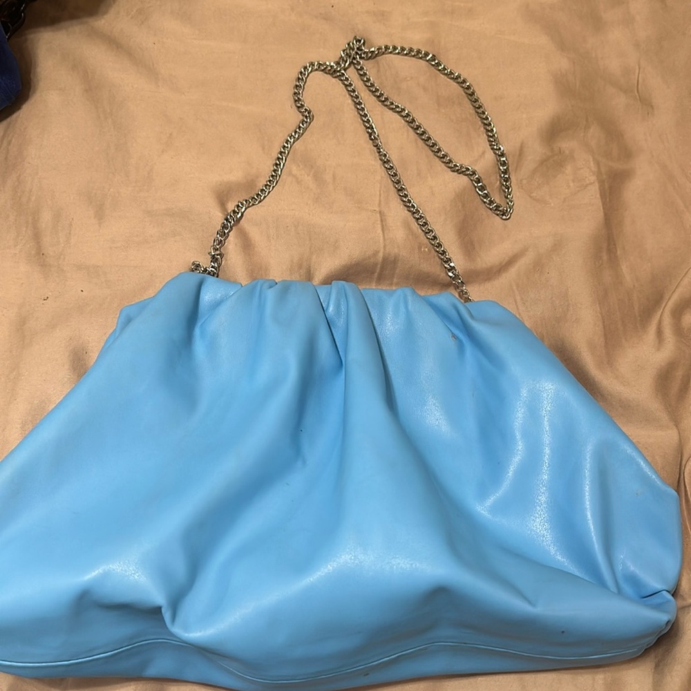 Blue Steve Madden giant clutch with chain